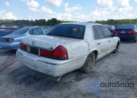 1999 Mercury Grand Marquis Gs z USA, uszkodzony, nr VIN 2MEFM74W7XX734151